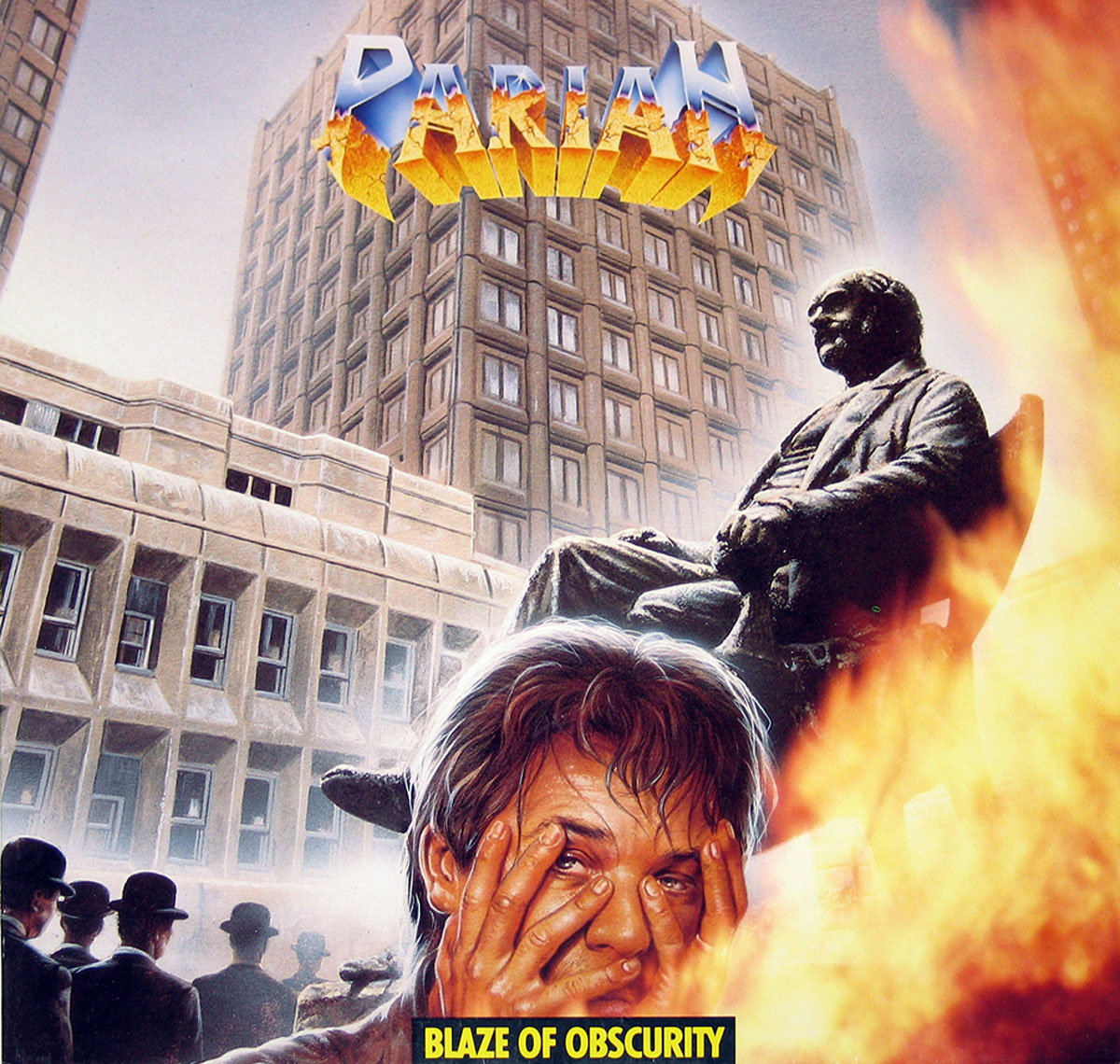 Album cover for Pariah’s Blaze of Obscurity, featuring a distraught man holding his face amid flames, with a seated statue and towering urban buildings in the background. Dark-suited figures in bowler hats stand ominously in the distance. Artwork by Andreas Marschall.